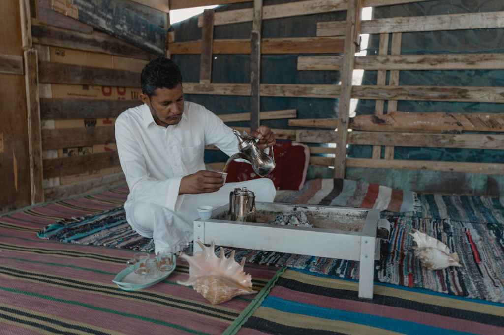 Bedouin man pouring tea