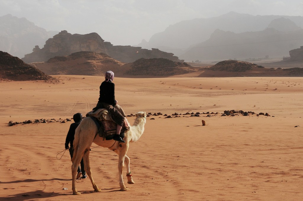 Woman on camel in Wadi Rum