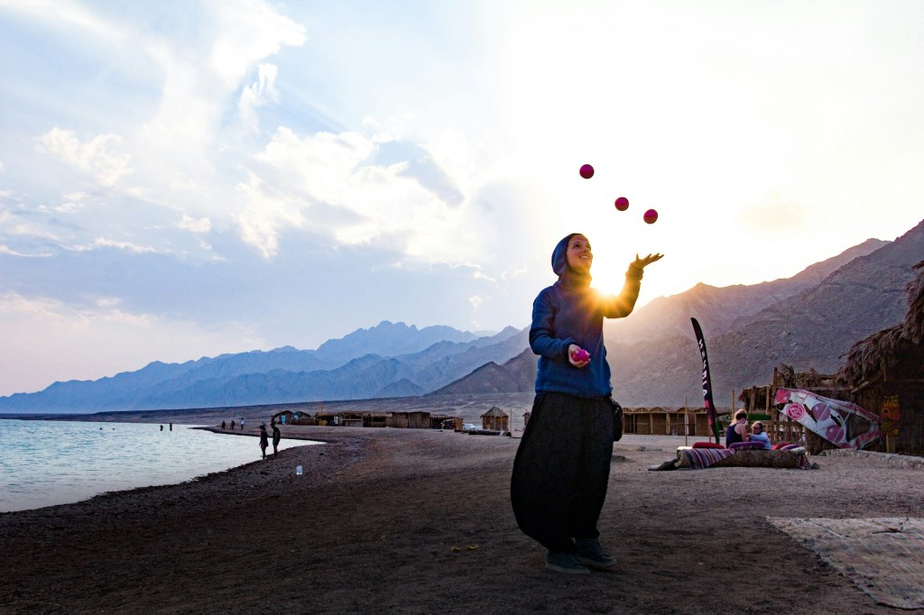 Bedouin kid juggling balls 